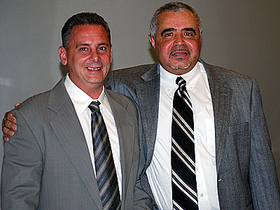 Ramon Guzman, Senior Case Manager of BTC (right) with a BTC Graduate (left)