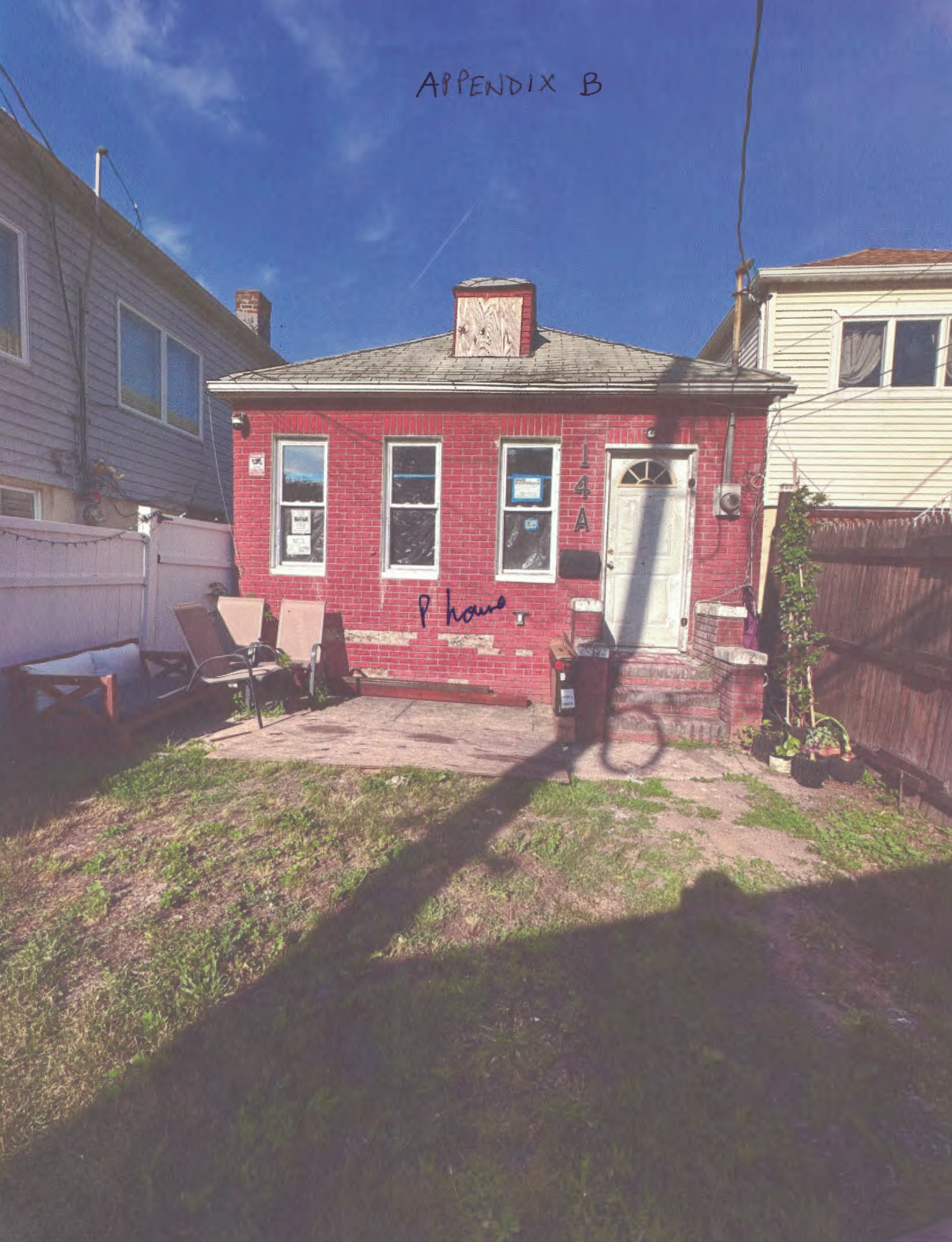 Appendix B, photograph of house and fence