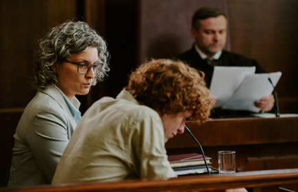 Teenager in court, looks dejected