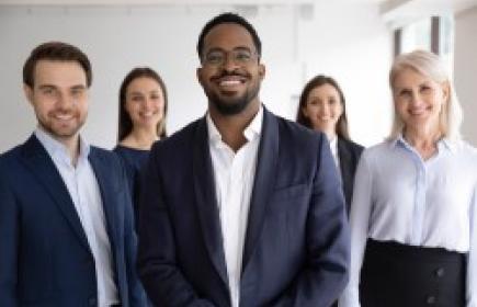 5 Lawyers standing and smiling at the camera