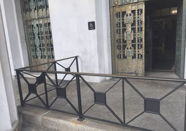 Main entrance. Entrance is accessed by a ramp.