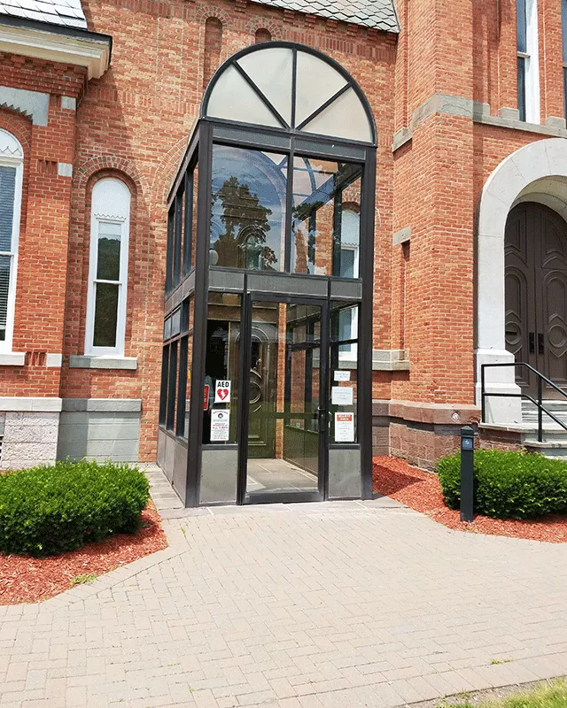 Picture of glass entrance to building.