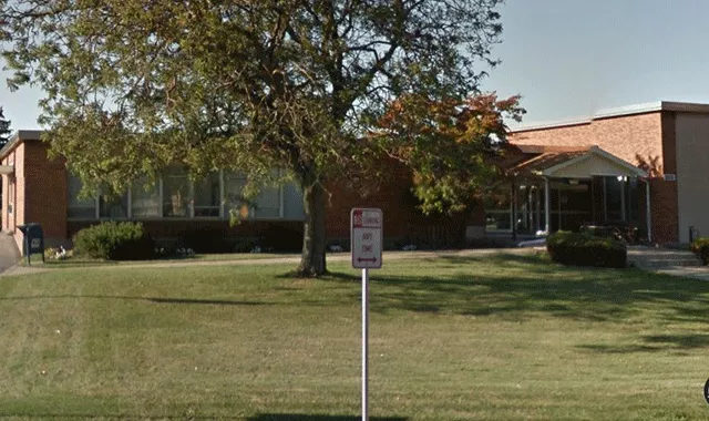 Description of photo: A view of Tonawanda City Courthouse from the lawn. There are steps that leads to the entrance. There is a walkway that is accessed from the left of the facility that leads to the same entrance.