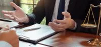 lawyer talking to client