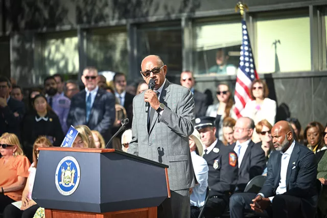 Photo: First Deputy Chief Administrative Judge Norman St. George presents remarks at the solemn tribute to the 9/11 victims and heroes 