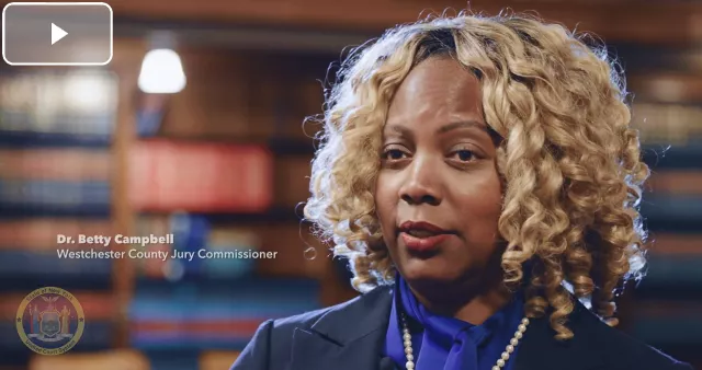 Dr. Betty Campbell, Westchester County Jury Commissioner, on screen