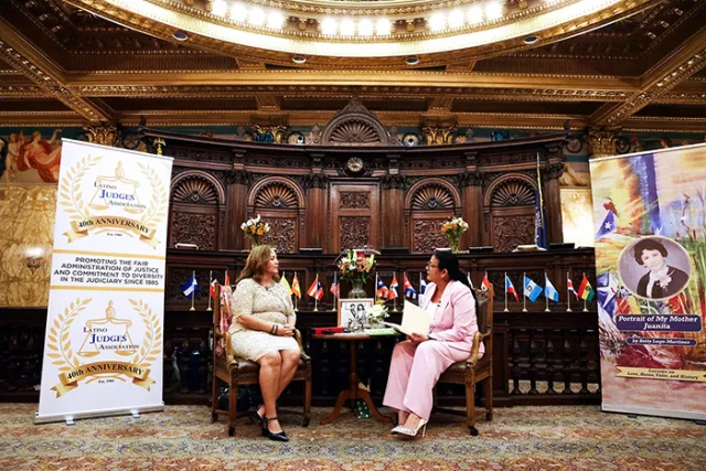 New York City Civil Court Judge Betty Lugo-Martinez and Appellate Division, First Department Associate Justice Llinét Rosado discuss Judge Lugo-Martinez’s book, Portrait of My Mother, Juanita at the Appellate Division, First Department’s Hispanic Heritage Month program in early October 