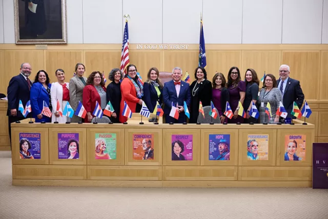 Chief Administrative Judge and keynote speaker Joseph A. Zayas (center, in red bow tie) with Ninth Judicial District judges and court personnel at the District’s lively Hispanic Heritage Month celebration in White Plains 
