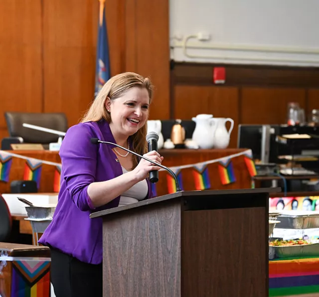 Principal Court Attorney Margot Gendreau addresses attendees at the early June PRIDE celebration at New York County Supreme Court’s Criminal Term in Lower Manhattan 