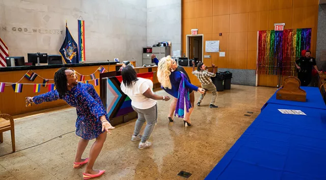Court employees join Porsche on the courthouse “dance floor,” adding to the vibrant program’s energy and flair 