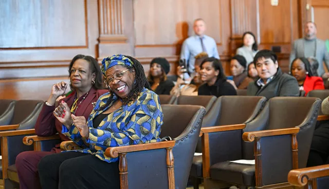 Administrative Judge Grays and Deputy Chief Administrative Judge for Justice Initiatives Edwina G. Richardson enjoy the uplifting music featured at the Queens court's February 4th Black History Month celebration