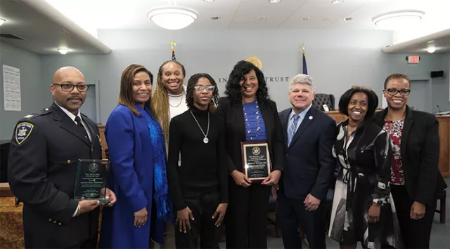 Photo: Honorees Captain Lydell Thompson and retired Court Attorney Adrienne Williams with (L-R) Suffolk County Supreme Court Justice Valerie Cartright, Anastasia Williams (daughter of Adrienne), performer Corey J., Administrative Judge Andrew Crecca, Suffolk County Family Court Judge Mary Porter, and Supervising Judge of the Supreme Court-Matrimonial Parts Cheryl Joseph 