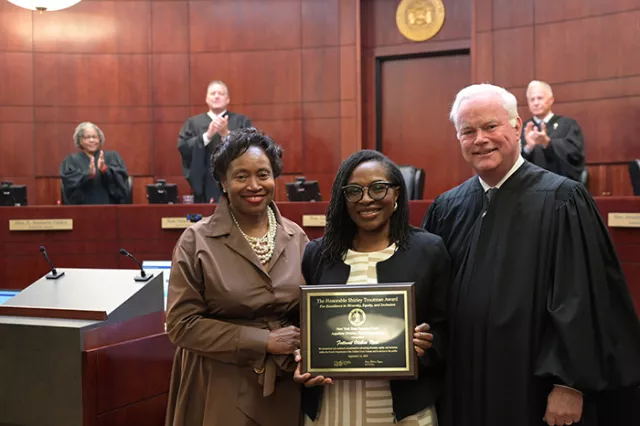 Photo (L-R): Court of Appeals Associate Judge Shirley Troutman, awardee Monroe County Family Court Judge Fatimat O. Reid, and Appellate Division, Fourth Department Presiding Justice Gerald J. Whalen at the Rochester ceremony honoring Judge Reid for her outstanding efforts to advance DEI