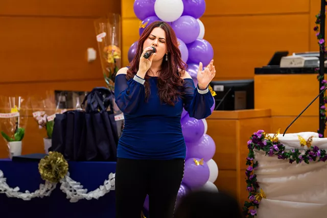 Photo: Senior Court Clerk Julia Veinblat captivated attendees with her heartfelt musical performance at the Brooklyn court’s Women’s History Month celebration 