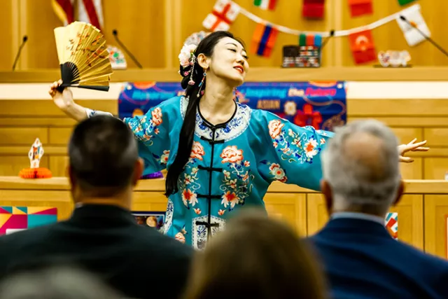 Network System Technician Helen Zhu of Queens County Supreme Court performs a classical Chinese dance at the Ninth Judicial District’s AAPI celebration in White Plains