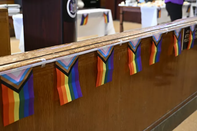 PRIDE flags adorn the courtroom at the June 5th tribute to LGBTQ+ art and artists