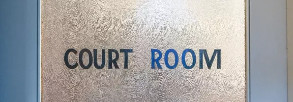 A door sign that reads "Court Room" 