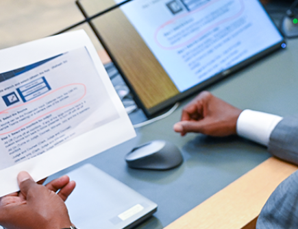 a judge holding a piece of evidence paper