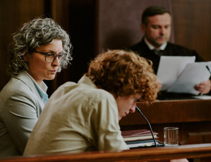 Teenager in court, looks dejected
